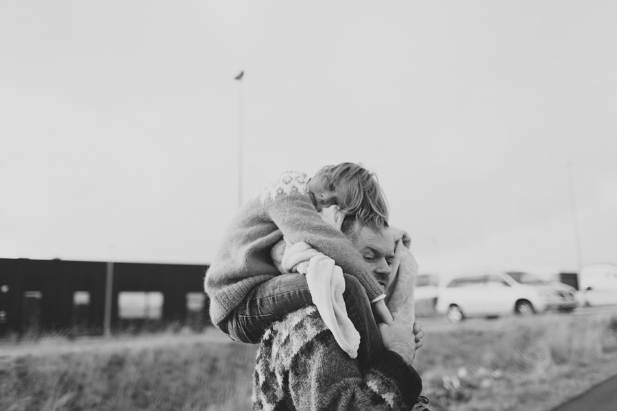 girl on daddy's shoulders